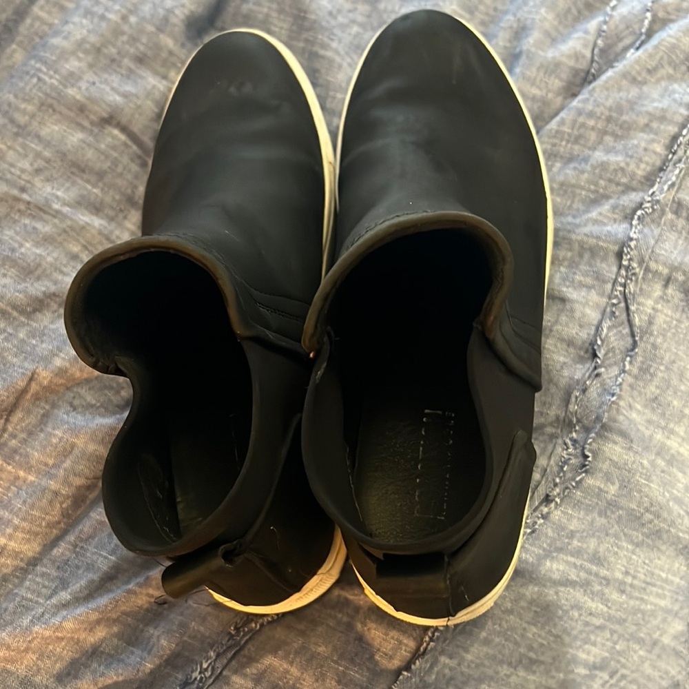 Black womens casual boots . white sole. nonsmoking home . size 7.5